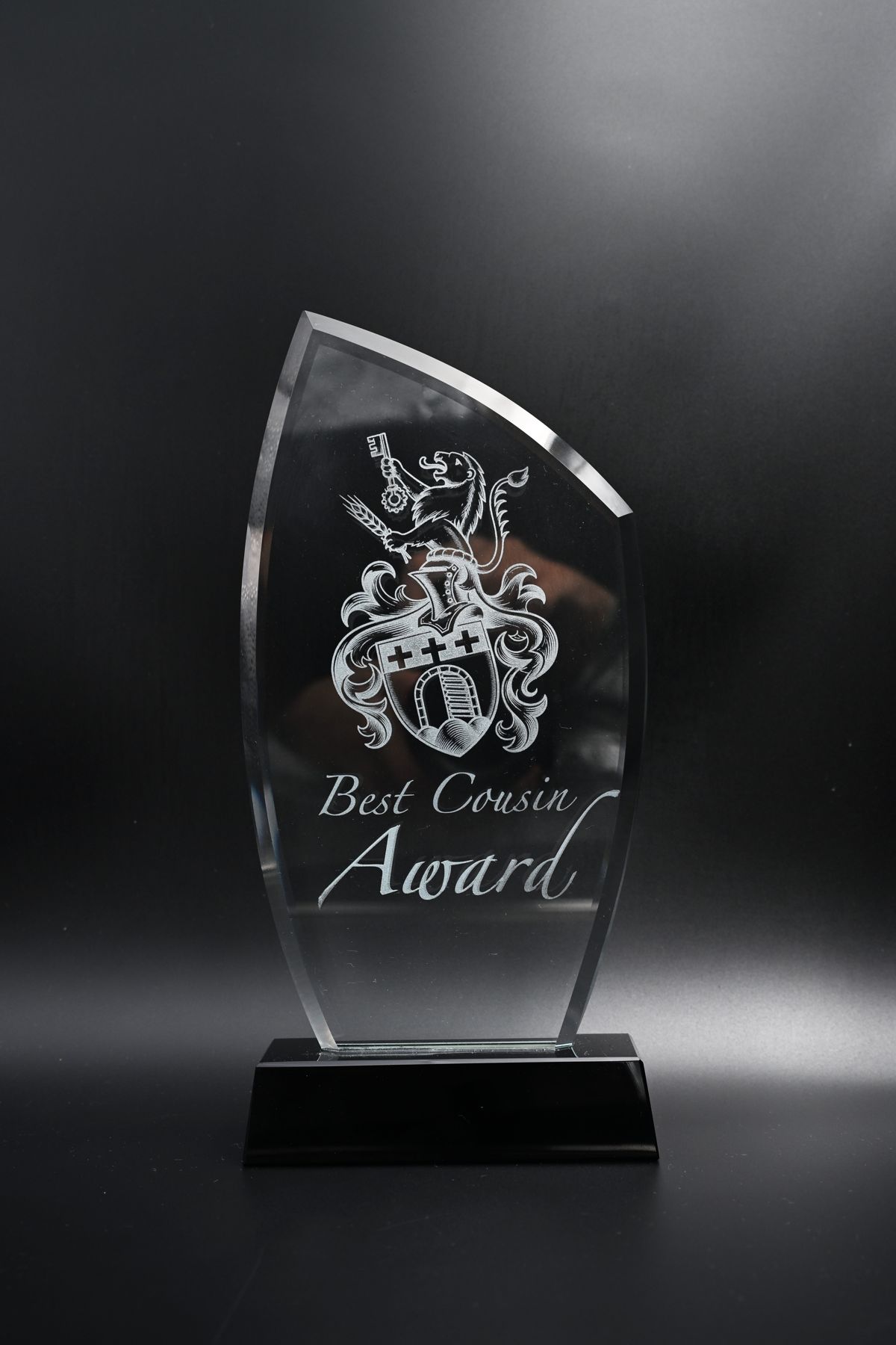 Crystal award engraved with a coat of arms