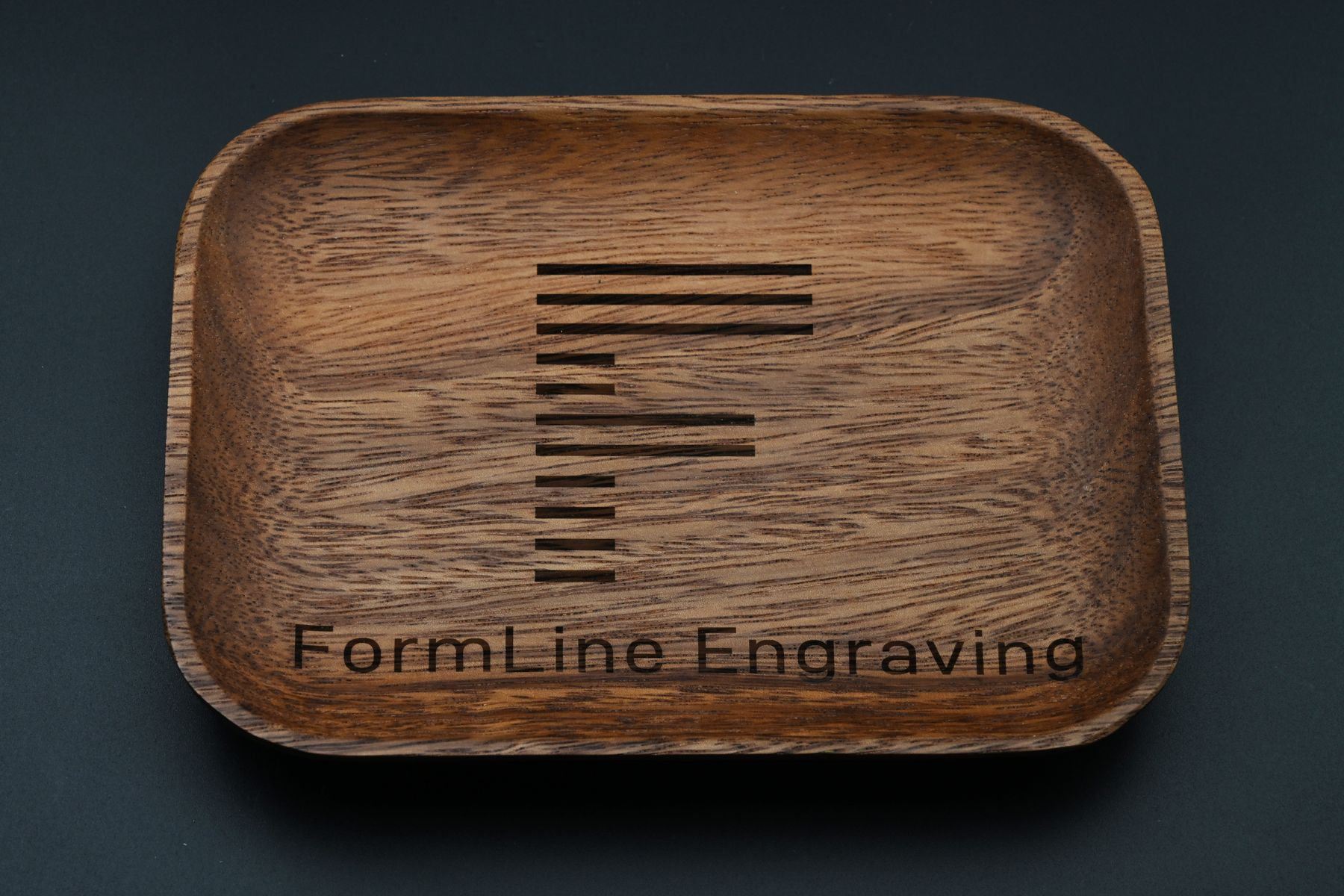 Wooden tray engraved with the FormLine mark